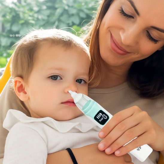 maman utilise le mouche bebe